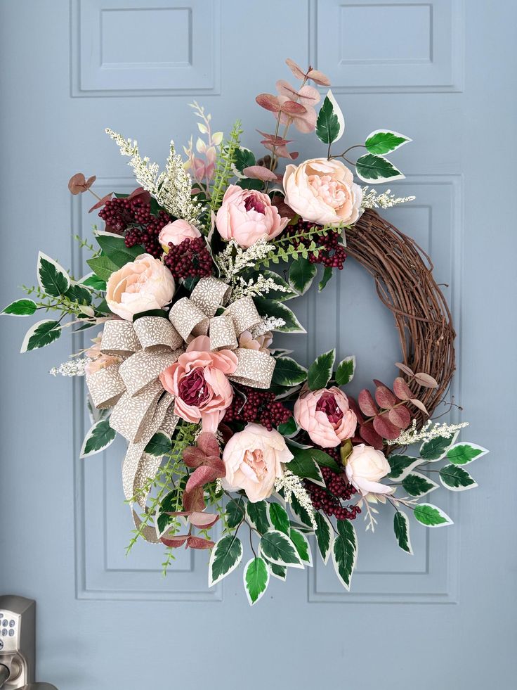 20 Creative Spring Wreath Ideas to Kick Off the Season (You Won't Believe #9!) - 1. Romantic Blush Peony Wreath